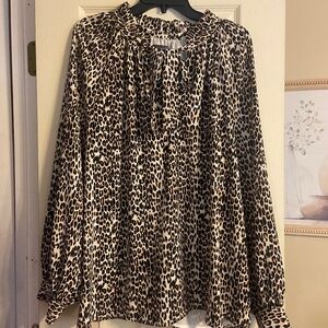 The limited cheetah blouse